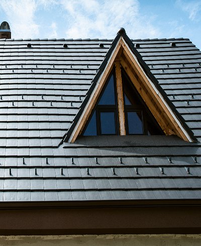 dark gray tiled roof repair service
